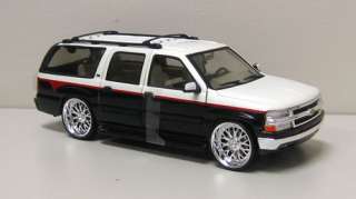  auction is for black white 2001 chevrolet suburban diecast model car 