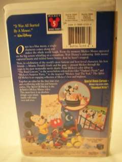 This is a Walt Disney The Spirit of Mickey VHS Tape. The clamshell 