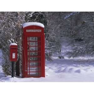 Red Letterbox and Telephone Box in the Snow, Highlands, Scotland, UK 