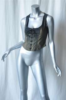 one part vest one part ultra sexy corsette top this denim blouse has a 