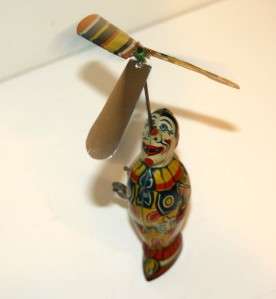 Vintage J. Chein Tin Litho Clown Balancing a Spinning Propeller 
