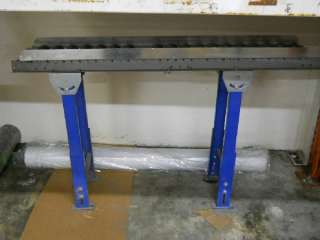 This is a used gravity roller conveyer, was mounted to a Nordson 