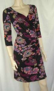 Co stretchy dress with paisley print on black background , vee 