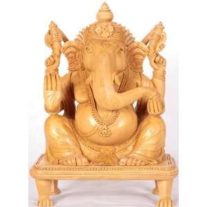  Lord Ganesha Seated on a Chowki   Kadamba Wood Sculpture 