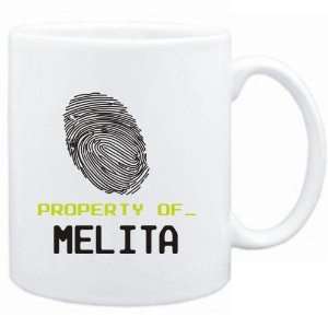 Mug White  Property of _ Melita   Fingerprint  Female 
