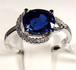 14KT W/Gold 3.08 cts Oval Sapphire & Diamond Ring  