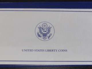 1986 S Silver Liberty Dollar and Liberty Half Dollar Commemorative 