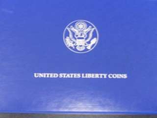 1986 S Silver Liberty Dollar and Liberty Half Dollar Commemorative 