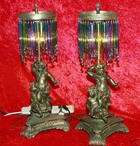 Antique Brass Spelter gilt cherub lamps art glass beaded shades 
