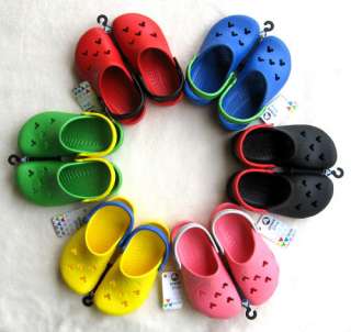   crocs™ shoe featuring Mickey Mouse silhouette holes with crocs logo